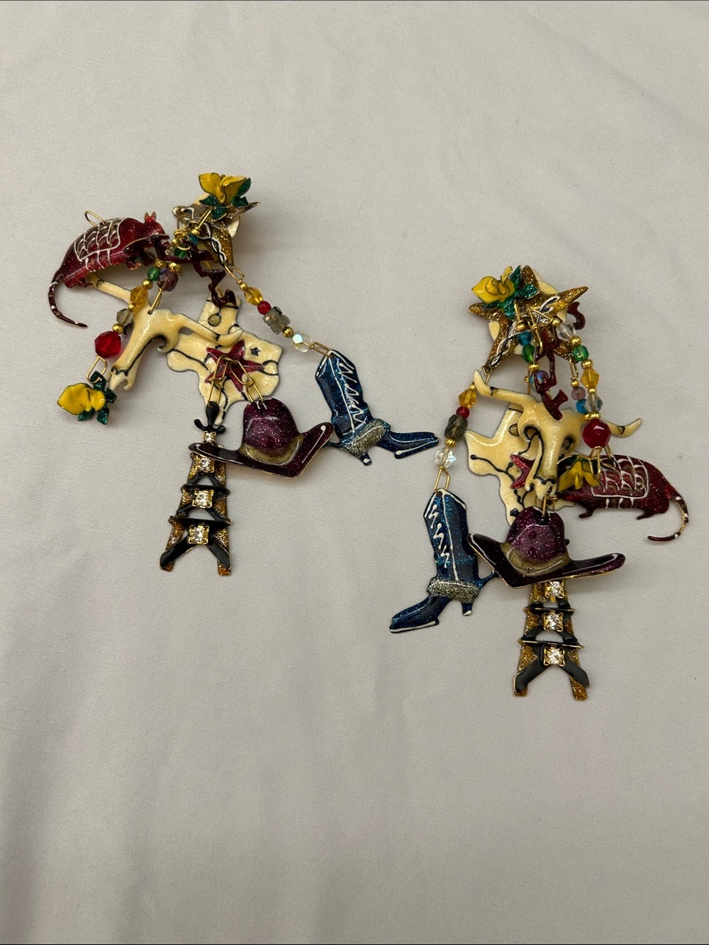 Lunch at the Ritz Texas-themed charm statement earrings.